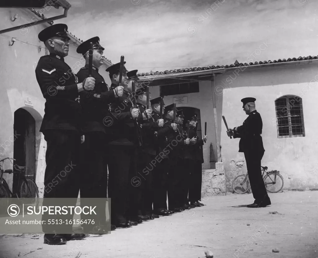 Cyprus Police. Truncheon inspection at the Nicosia Divisional H.Q. July 1, 1951. (Photo by British Official Photograph).