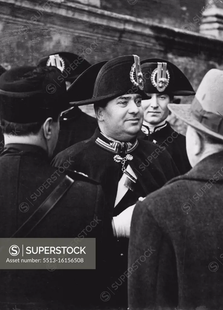 And They Really Wear Those Hats! - Picturesque head dresses in Italy. Doesn't this officer of the municipal guard, which forms a part of the famous Carabinieri - troops, look like a little Napoleon. January 25, 1948.