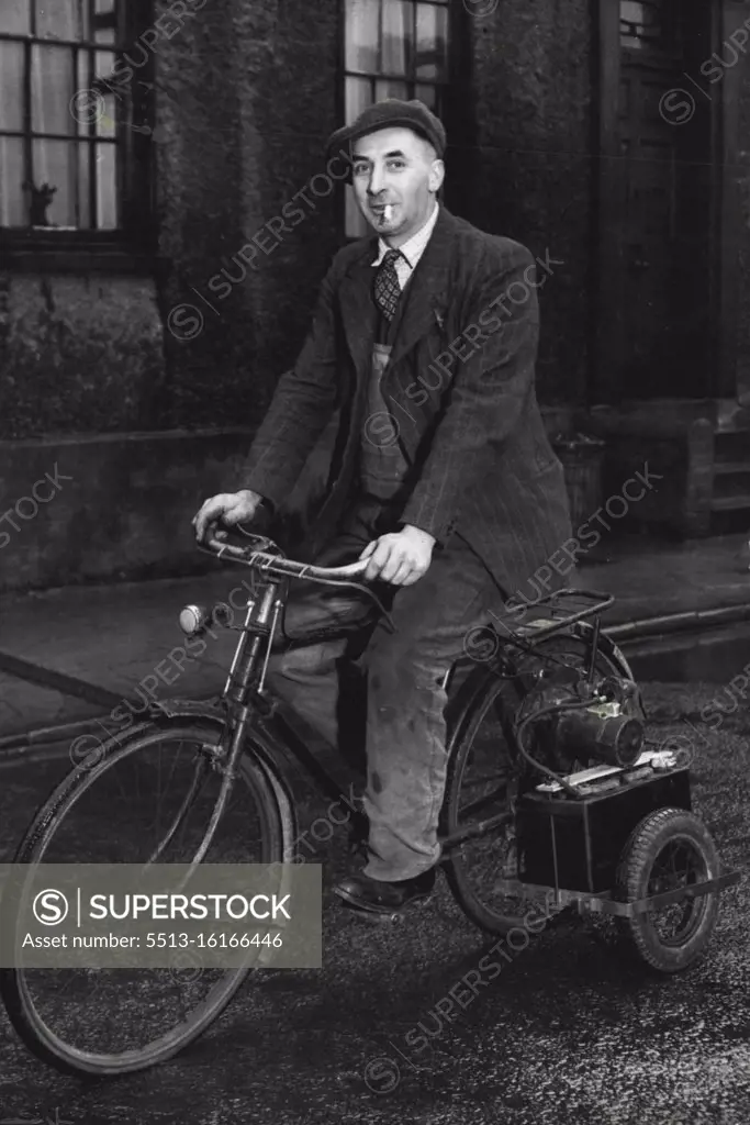 No "Basic" Needed -- Mr. Bullock on his electric cycle. It is absolutely noiseless, climbs steep hills, and has only one fault - it develops too much speed to easily on the flat! Determined not to be deprived of mechanical locomotion by the abolition of basic petrol, Mr. Tom Bullock, of Berrington street, Herreford, has devised a method of transport which will be envied by errand boys. It is an electric bicycle driven by a 12 volt car battery. He bought a second-hand bicycle, fixed a small carriage on it to carry battery and starter-motor; the machine is chain driven, has lights and a born powered off the same battery. January 13, 1948. (Photo by Fox Photos).