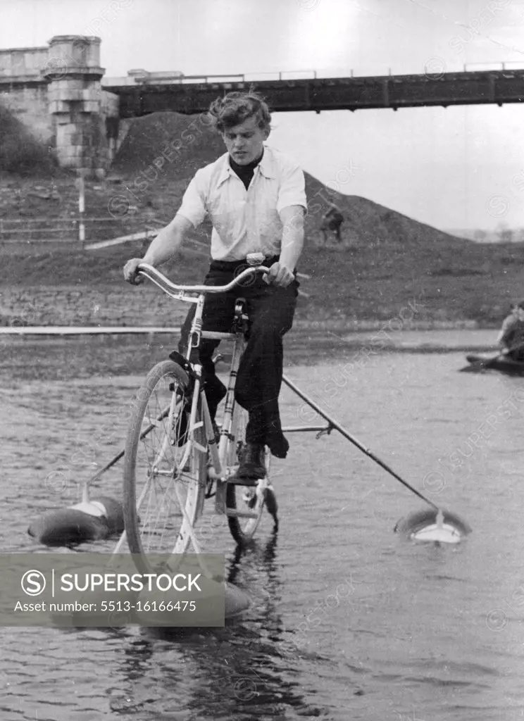 "Swimming Cycle" Inventor On Murder Charge: Eugen Holzgethan, now accused of murder, on his invention the "Swimming Cycle". Vienna Police believe they have now cleared up the case of the Vienna housewife Elisabeth Schamadek. She was murdered with A 10 Lb, weight. It is claimed that 26-year-old Eugen Holzgethan has admitted to the murder, and that he cut up the body. It appears that the dismembered parts were wrapped in newspaper and buried in a suburb of the capital. August 18, 1953. (Photo by Paul Popper).