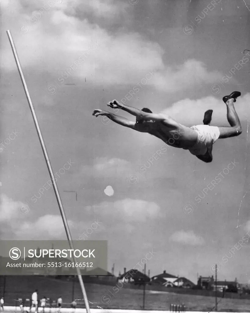 Pole Vaulting is an art and Mullins has good technique. He's in the top flight, but not quite a champion. Caught in the air in the hop, step and jump. May 31, 1948.