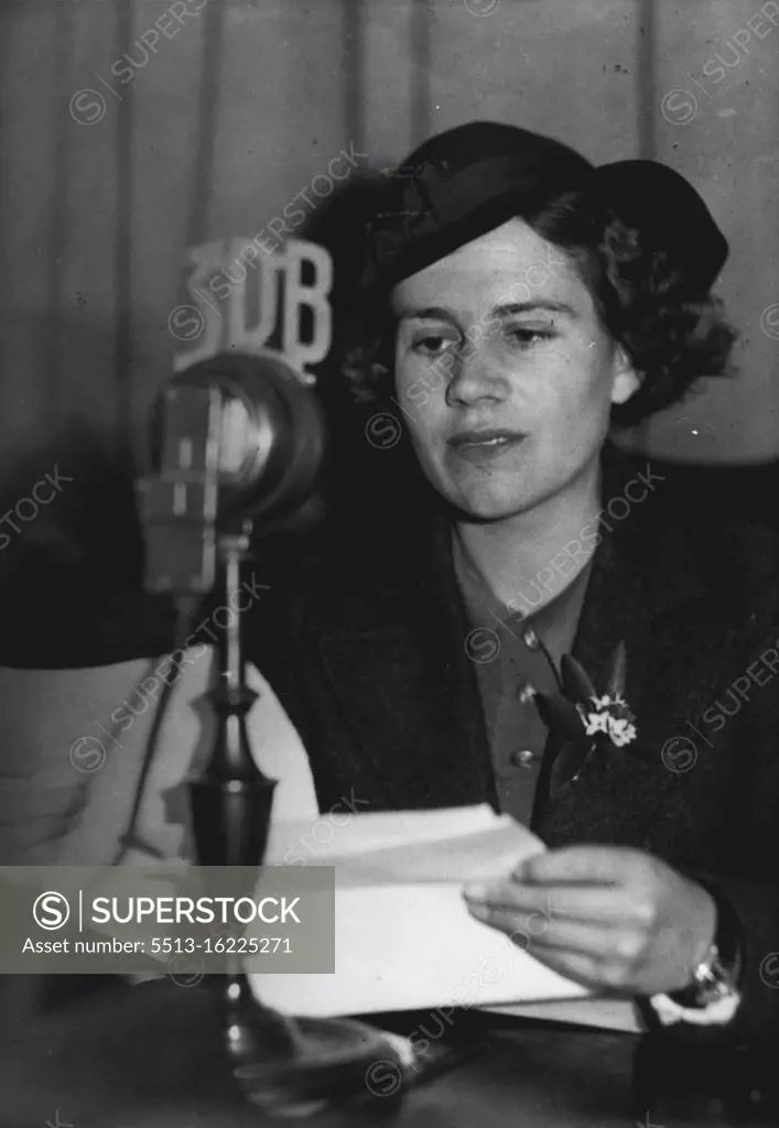 Miss J. Barrell broadcasting a geography lesson to children from Melbourne. August 2, 1937.
