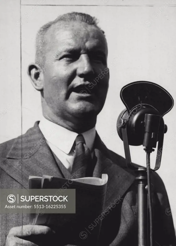 Wallace Sharland ***** football commentator, who is once more at the microphone each Saturday afternoon with a graphic description of "the match of the day" Paint out lettering a microphone. April 25, 1939. (Photo by C. G. Frazer)