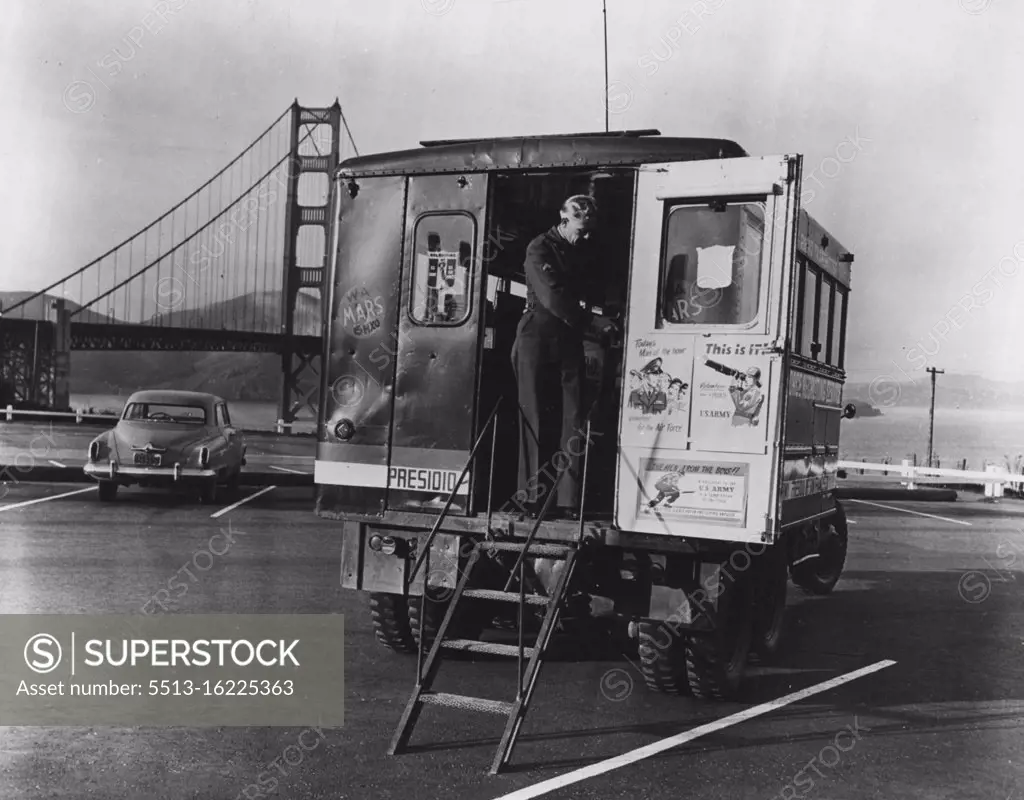 Mobile Minute Men -- This ***** mobile unit is being opened for ***** inspection near the Golden Gate Bridge in San Francisco, California. Nearly 3,000 amateur radio operators are ***** in a manner ***** contributes to the defense of their *****. December 08, 1950.