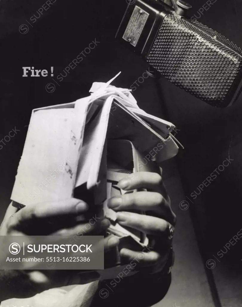 Radio Sound Effects. WIP broadcasters in Philadelphia have devised ingenious sound effects to accompany programs. Here the destruction of a 30 story building is simulated by ten fingers and 3 strawberry boxes. January 21, 1955. (Photo by PIX Publishing Inc.). 