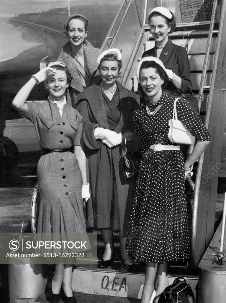 Editor of Vogue Export Book, Rosemary Cooper (center), with four Vogue mannequins (from left), Jean Dawnay, Della Oake, Laura Parnell, and Viscountess Boyle, who arrived by Qantas plane yesterday. January 14, 1952.
