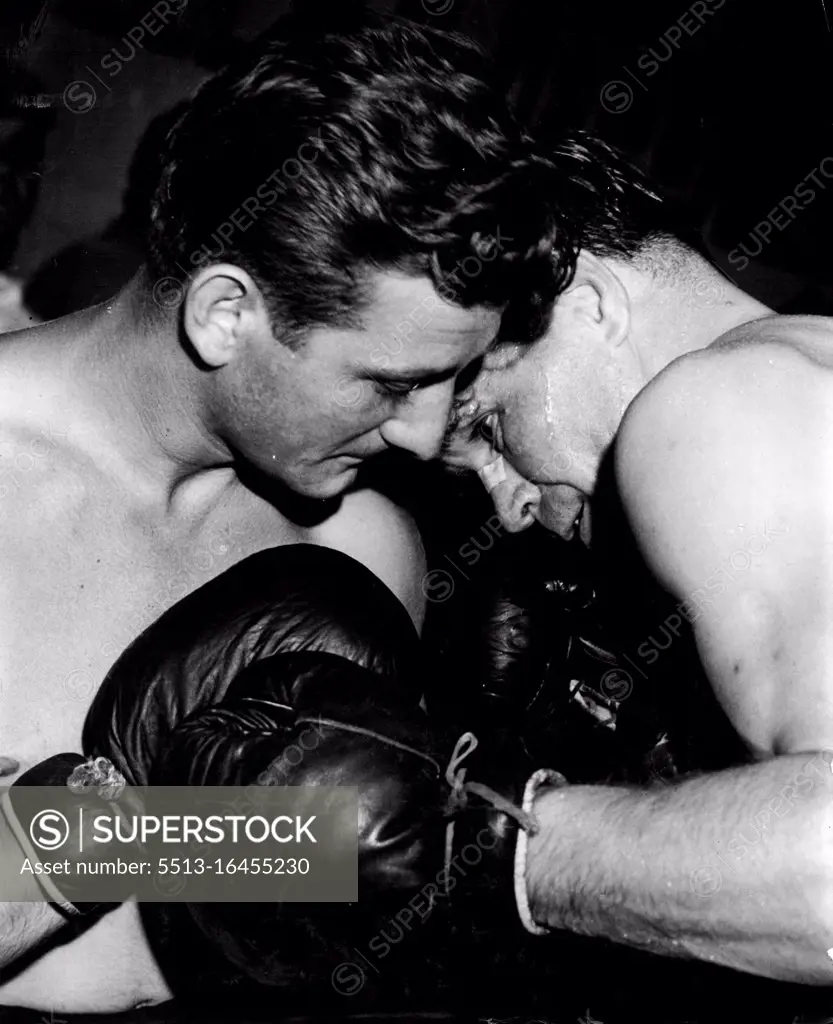 Jimmy Millette (left) boxes with Benny Evans. February 28, 1948.