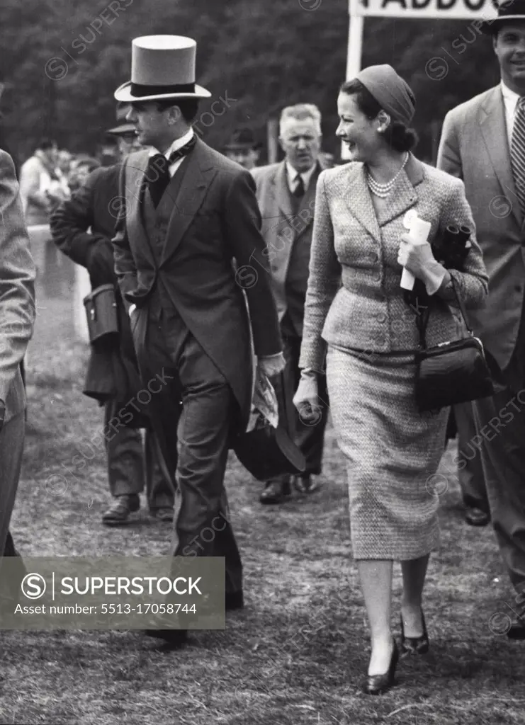 Gene Tierney And Aly Khan At The Oaks -- Hollywood actress Gene Tierney with Aly Khan, son of the Aga Khan, at Epson races to-day (Thursday), when they saw the Aga Khan's ***** second to Ambiguity in the Oaks Stakes. June 04, 1953. (Photo by Reuterphoto).