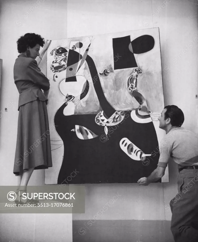 Peggy Guggenheim In Venice This is the famous painting "The Seated Woman" by Joan Miro which is valued today 30,000 dollars. January 11, 1949. (Photo by Interfoto).