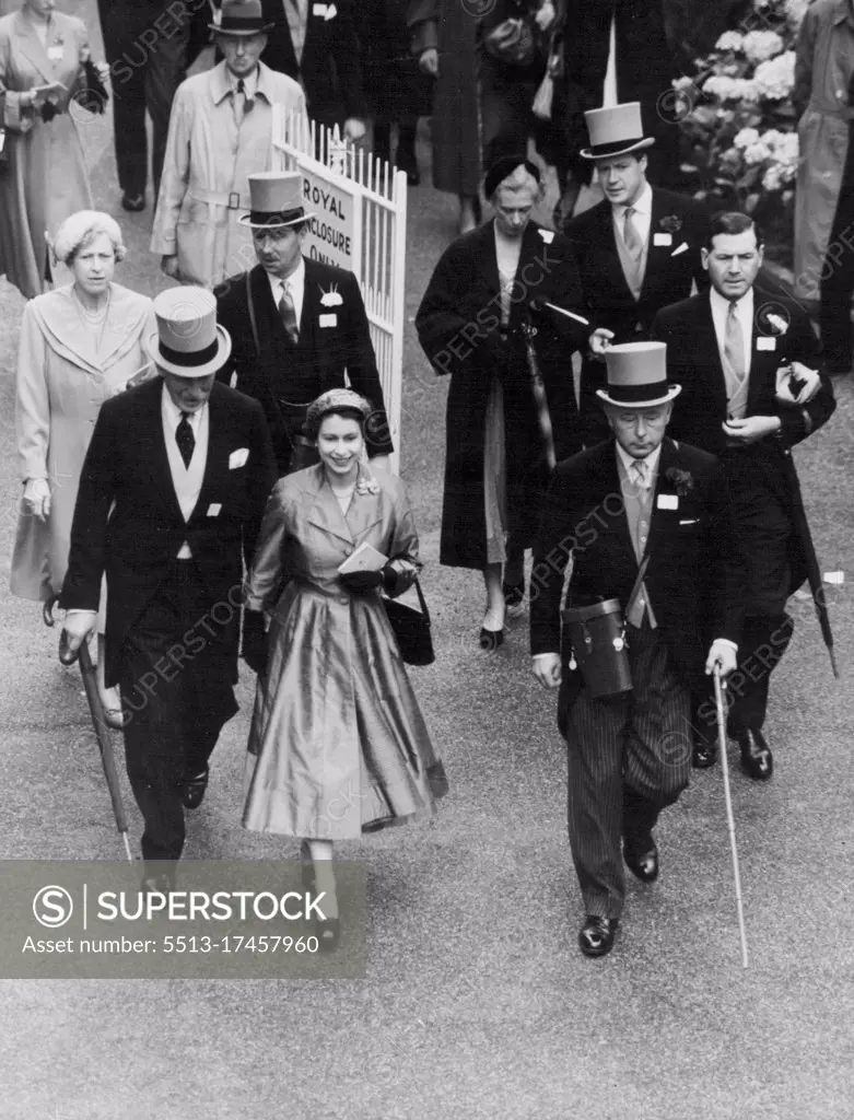 The Queen Wins Hunt Cup At Ascot -- The smiling Queen walking to the Unsaddling Enclosure after her horse had won the big race of the day at Ascot. On the right is the Duke of Norfolk and behind The Queen can be seen the Princess Royal. At the second day of the Royal Ascot Meeting, the big race of the day, the Royal Hunt Cup, was won for Her Majesty The Queen by her horse "Choirboy" ridden by D. Smith. June 17, 1953. (Photo by Fox Photos).