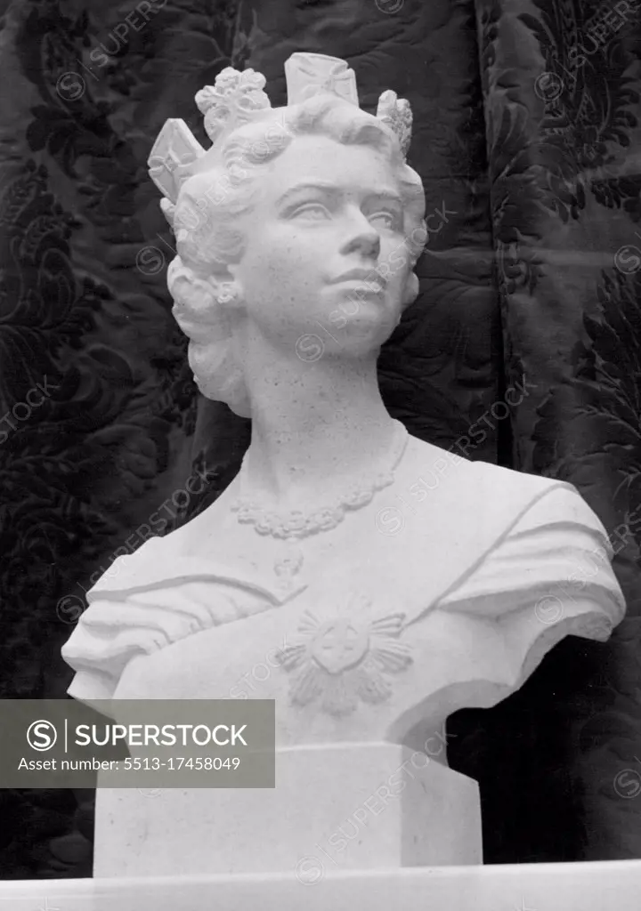 The Famous In Sculpture -- Bust of Her Majesty Queen Elizabeth II, in bianco del mare, by George H. Paulin, H.R.I., A.R.S.A., F.R.B.S. The Society of Portrait Sculptors are holding an Exhibition at the Imperial Institute, South Kensington, S.W. Many of the most famous sculptors are exhibiting. November 16, 1953. (Photo by Fox Photos).