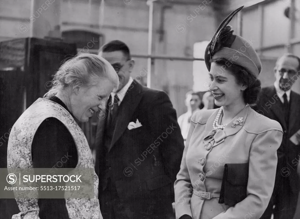 Princess Elizabeth Meets Railway Worker - Prince Elizabeth is seen chatting with winner Clarke, a polisher of 42 years service during her visit to the carriage and wagon works of the British Railways at Wolverton, Bucks., today March 11. this was the first Royal visit to British Railways since they came under state control. March 23, 1948. (Photo by Associated Press Photo).