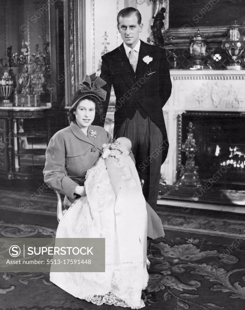 Baby Prince's Christening At Buckingham Palace : Royal mother and father with their baby son. Princess Elizabeth (holding Princess Charles) with the Duke of Edinburgh, photographed in Buckingham Palace after the christening. Prince Charles, the name by which Prince Elizabeth's son will be known to the nation, was christened Charles Philip Arthur George in a ceremony at which Dr. Fisher, Archbishop of Canterbury, officiated at Buckingham Palace, London, this afternoon (Wednesday). Prince Charles's sponsors were: the King, Queen Mary, (great-grandmother), Princess Margaret, King Haakon of Norway, Prince George of Greece, the Dowager Marchionessof Milford Haven, Lady Brabourne and the Hon. David Bowes-Lyon. December 15, 1948.