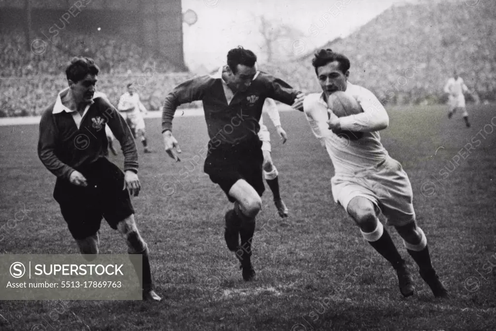 England And Wales Draw At Twickenham -- D.W. Swarbrick (England) attempts a break through closely followed by two Welshmen. Wales and England fought a draw - 3 points all after a hard Rugby battle at Twickenham, London. January 17, 1948. (Photo by Sport & General Press Agency, Limited).
