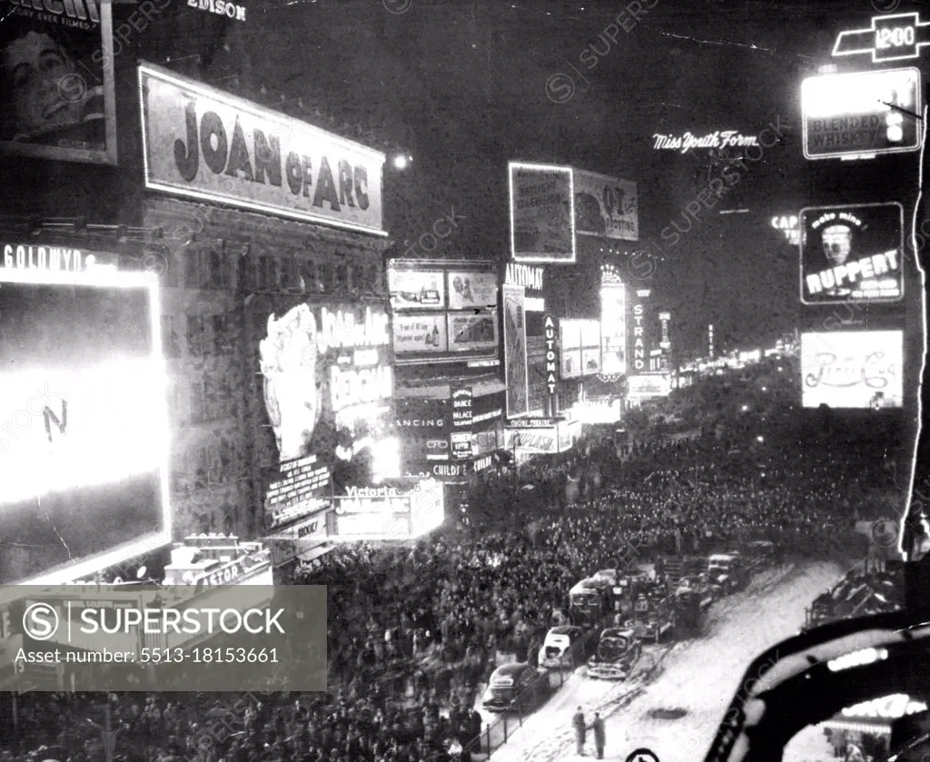 An estimated 350,000 persons throng in New York Times Square at midnight, Dec.31, for the annual New Year's observance. This picture was made from the roof of the Bond Building at Broadway and West 45th Street, looking north. January 29, 1949. (Photo by AP Photo).