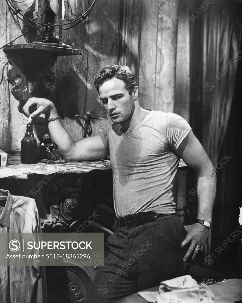 Marlon Brando, re-creates on the screen, his great triumph as Kowlaski, who bullied and tore at Blanche's (Vivian Leigh) neurotic self in Tennessee Williams Pulitzer prize winner, "A Streetcar Named Desire".A Streetcar Named Desire/Marlon Brando portrays Stanley Kowalski in the 1951 production of the Tennessee Williams play.More of the Same : Greer Garson's description of Marlon Brando: "He enters a room with all the unobstrusiveness of a guided missile". October 29, 1954.