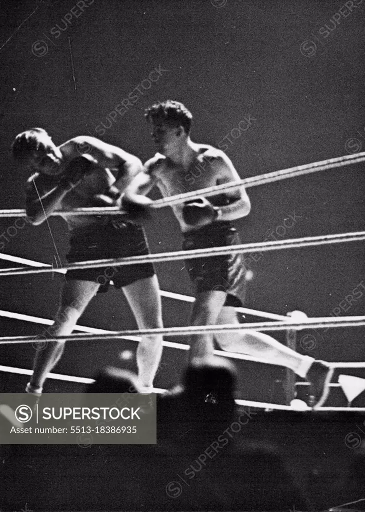 Strickland (on right) lands punishing right hand blows on Neusel, and nearly hits him over the ropes.Boxing - Heavy weight contest (12-3min. Rounds) between Walter Neusel (Germany) and Maurice Strickland (New Zealand), at the Empire Pool, Wembley, London.Neusel was declared the winner on points. October 19, 1937. (Photo by Sport & General Press Agency Limited).