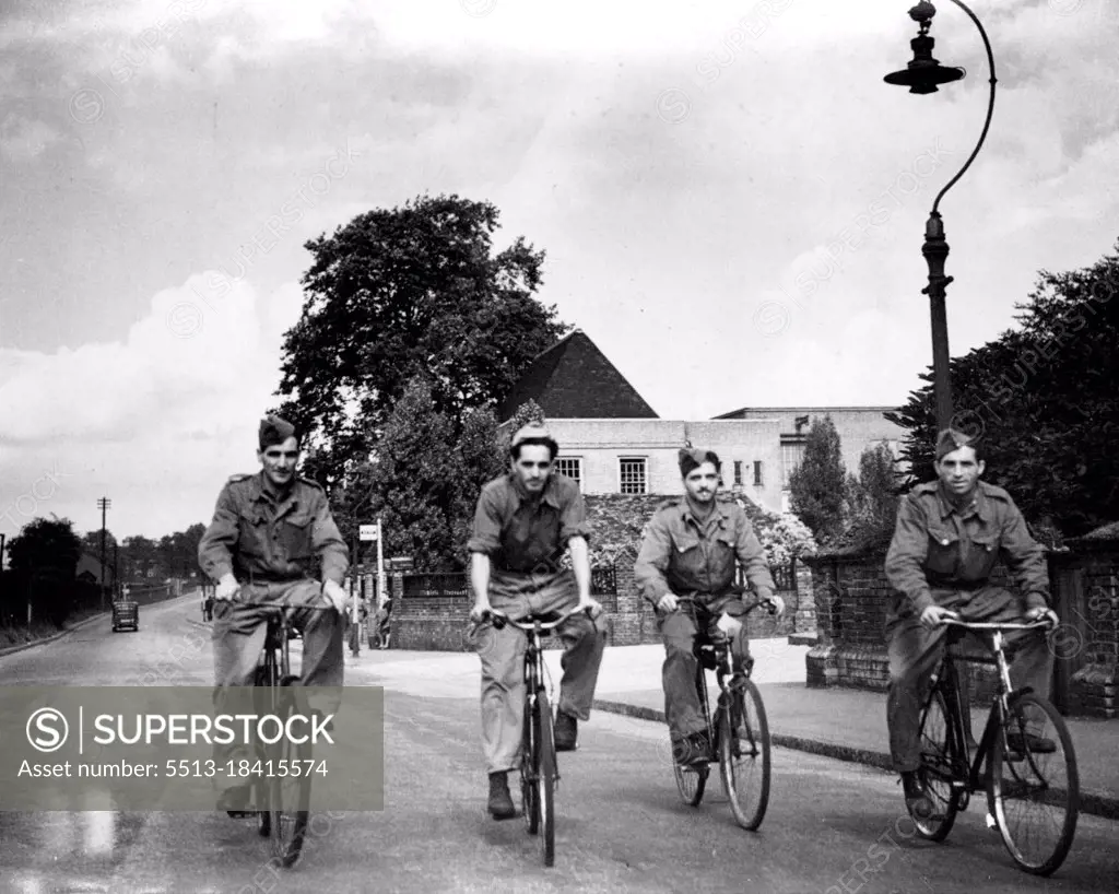 Italians Help In Britain.A party of "Co-operatives" after finishing a day's work are seen enjoying the beauty of the English countryside on cycles.More than 60,000 Italian Prisoners of War in this country have taken advantage of the ***** Government's invitation to become ***** in the common war effort.***** "Co-operatives", as they are now played, are formed into units organised ***** by Italian officers and N.C.O.'s and are not permitted to talk with members of the public, visit private buses, if invited to do so, and visit ***** at the discretion of their O.C., but they not enter public houses or ***** public conveyances, expect on duty. August 30, 1944. (Photo by Pix Photos Ltd.)
