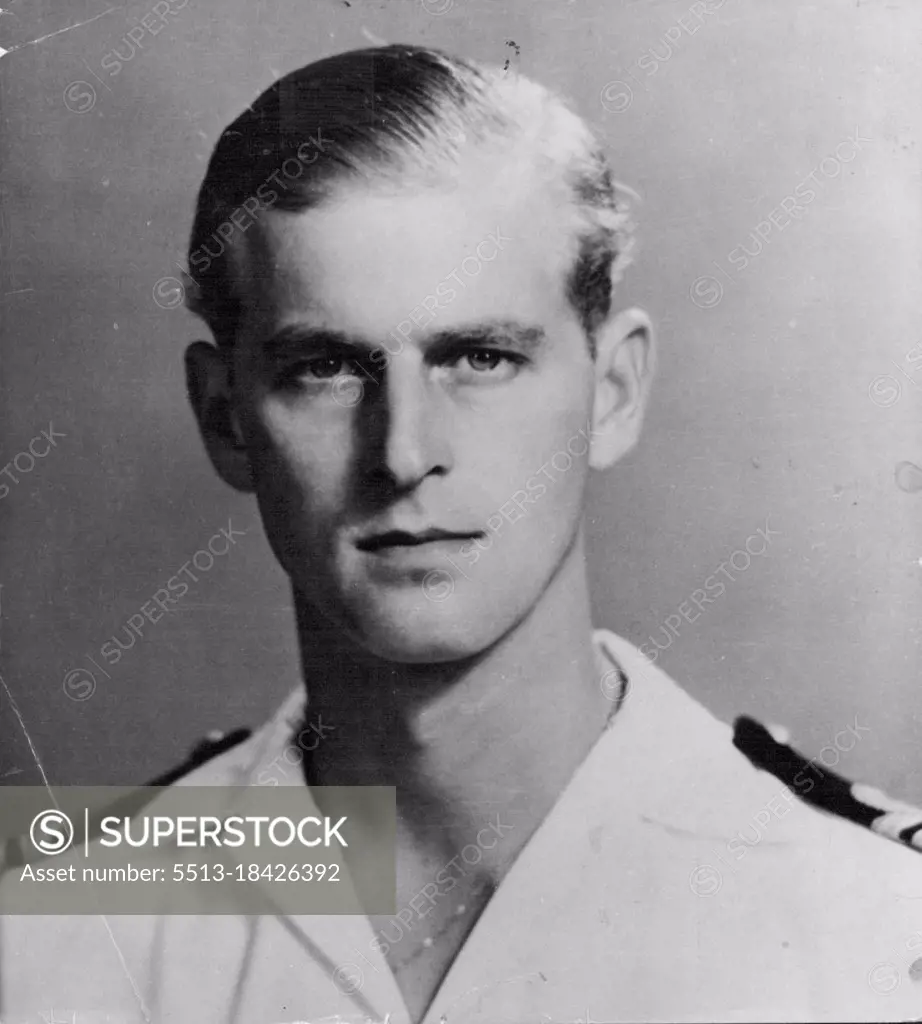 Young Man of the Moment: A recent Picture of Lt. Philip Mountbatten, R.N., formerly Prince Philip of Greece. An official statement regarding reports of the betrothal of H.R.H. Princess Elizabeth to the former Prince is expected from Buckingham Palace within the next day or so. Here Lt. Mountbatten is seen in tropical uniform of the Royal Navy. He joined the senior service as a midshipman at 19, and served at the Battle of Matapan in HMS Valiant. July 09, 1947.