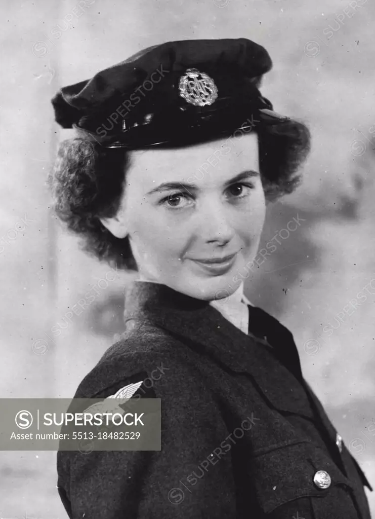 The W.A.A.F. Poster Girl - Miss Elizabeth Harvey photographed in W.A.A.F. uniform wearing hat. The W.A.A.F. Poster Girl is Elizabeth Harvey, who lives at ***** Latmore Avenue, Claygate, Surrey. She was chosen a week ago from six semi-finalists at a meeting which took place at the Air Ministry Whitehall, where the judges were Mr. William Dring, A.R.A., Air Chief Commandant Lady Welsh, Director of W.A.A.F., and Air Chief Marshal Sir Phillip Joubert de la Perte, K.C.B., C.I.C., D.S.O. Miss Harvey, who is tall and slim, is at present working for the Control Commission at Lubbeoke, Germany, was born in 1923 and was educated at St. Stephons College, Folkestone and Hillside Covont College, Farnborough, Kent. October 1, 1946. (Photo by British Official Photograph).