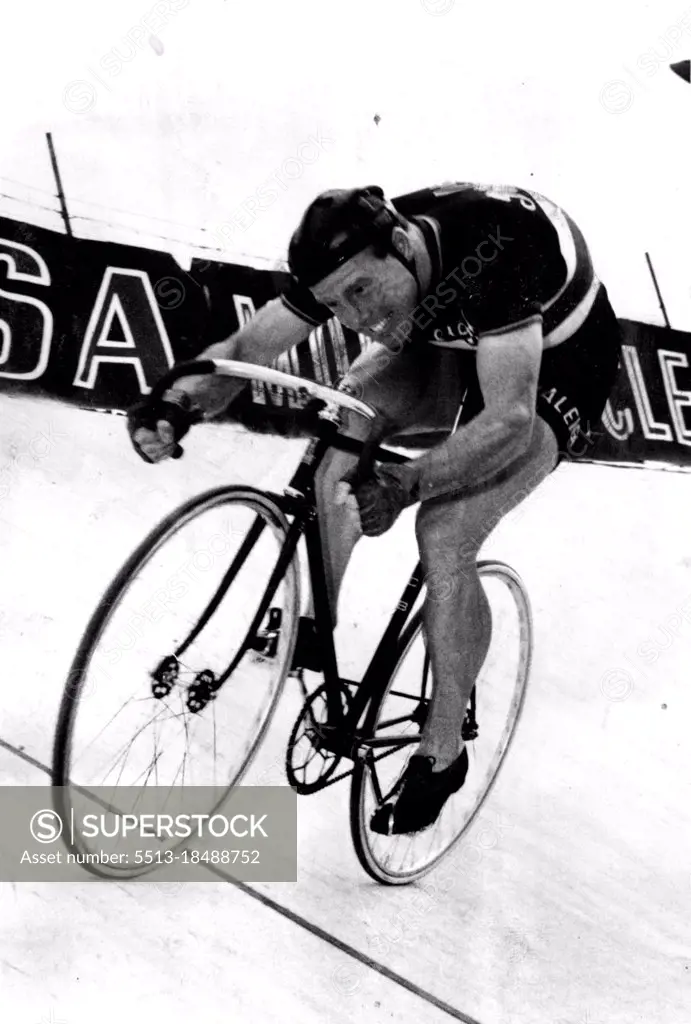 British Champion sprint cyclist Reg Harris, training at the North Essendon board track for his Victorian race. December 08, 1953.