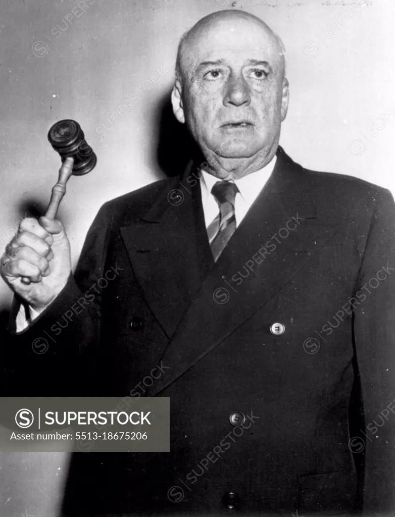 New Speaker -- Rep. Sam Rayburn (D-Tex) Poses with gavel upraised after his election today as speaker of the house of representatives. January 3, 1948. (Photo by AP Wirephoto).