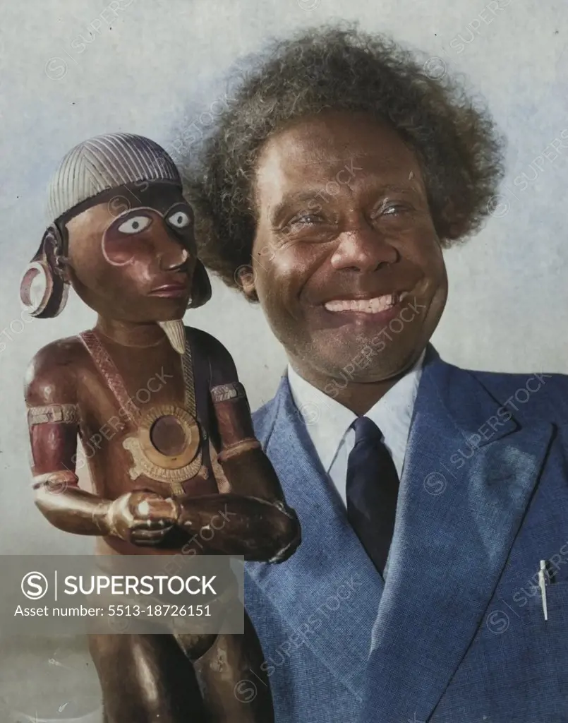 This idol, Kimbo, was worshipped by Solomon Islanders in cannibal days as a god of war.It was brought to Sydney today by Pastor Kata Ragoso, president of Western Solomons Seventh Day Adventist Mission and chief of the Marovo tribe, which saved 200 Allied airmen during the war.Pastor Ragoso, who is on his way home, arrived in Sydney today in the Oronsay, after attending a conference of his church in San Francisco.He is in charge of 4000 parishoners, 56 schools and two hospitals. June 28, 1954.