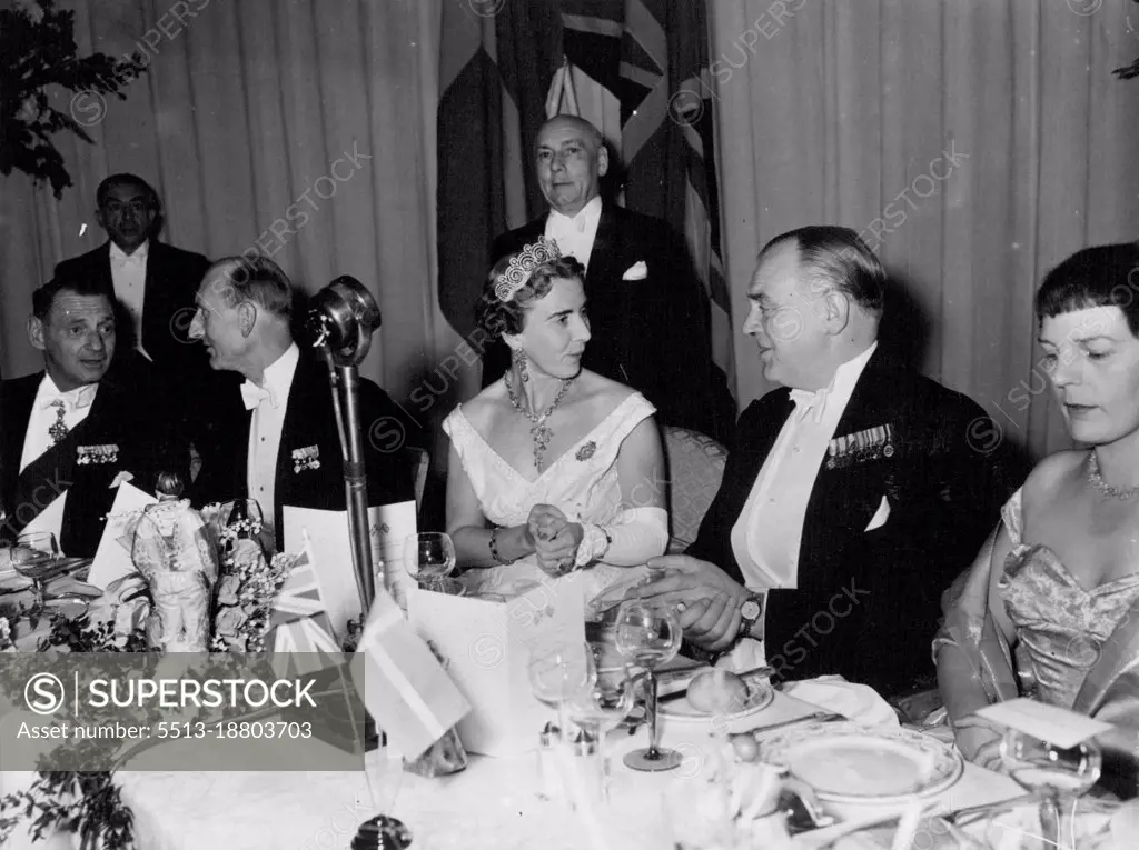 Picture Shows:- Queen Ingrid discusses a current topic with Mr. Gwily Lloyd-George, Great Britain's Home Secretary.  September 22, 1955. (Photo by Evening Standard)