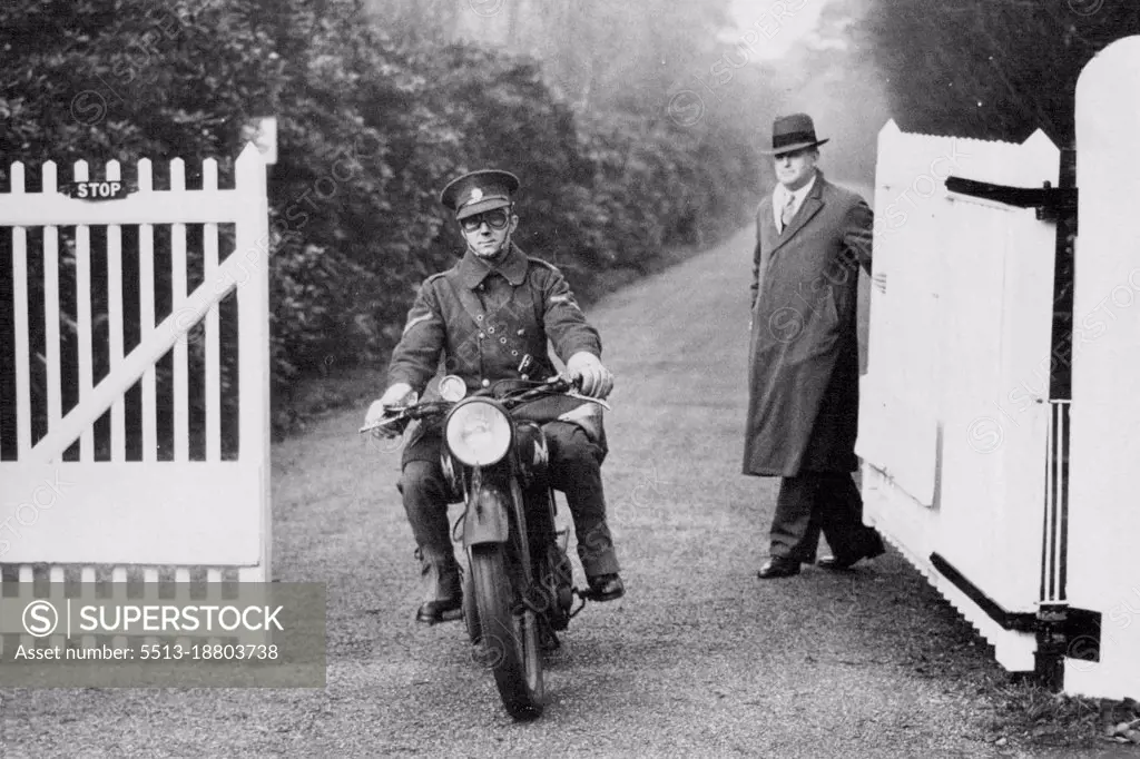 The Motor Cycle Dispatch Rider Leaving fort Belvedere with the Abdication act after the king Had Signed it this afternoon.King Edward's last state Documents Dispatch Rider takes Abdication act back to London after the royal Assent.Sunningdale, Berkshire, Eng, December 11- King Edward VIII Signed away his throne at Fort Belvedere, His Suburban home near here, this Afternoon. The Abdication Bill, which received its first reading in the house of Commons last Night, Passed Through Parliament at 1.52 P.M. today, and was taken by a motor-cycle Dispatch rider to fort belvedere for the "Royal Assent" - The King's Signature which made the bill a law. December 11, 1936. (Photo by Associated Press Photo).
