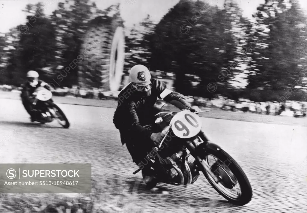 Duke Leads The World -- In the lead... Geoff Duke on a 500 C.C. Gilera, leads the field during the Italian Grand Prix.Geoff Duke, who won the Italian grand Prix at Monza on Sunday, new leads in the 500 class world championships. September 10, 1953. (Photo by Paul Popper, Paul Popper Ltd.).
