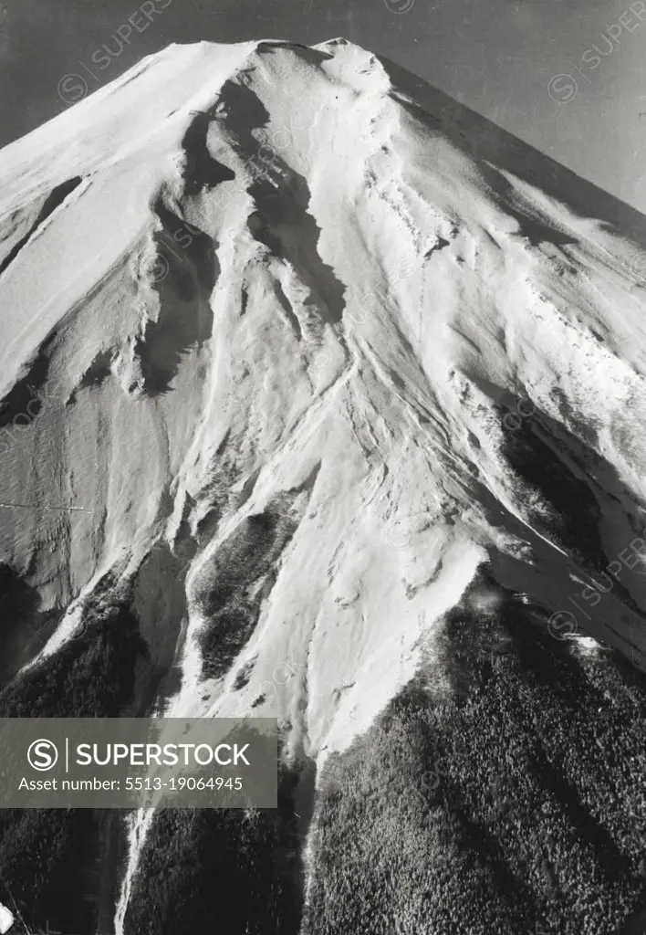 The biggest avalanche in the history of Mt. Fuji--Japan's sacred mountain -- on November 29th swept 16 University students thousands of feet to their deaths. Three students had miraculous escapes, emerging alive after they had been swept nearly 1000 feet.The course of the avalanche can be seen in the deep cleft of the let bottom *****. January 11, 1955.