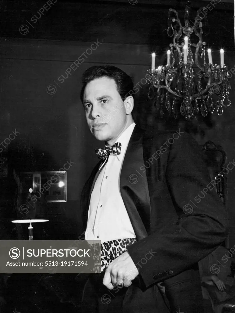 George London, the Metropolitan Opera's new bass-baritone4 chooses hand-blocked leopard-print cummerbund, tie; Brooke Cadwallader. April 20, 1953.