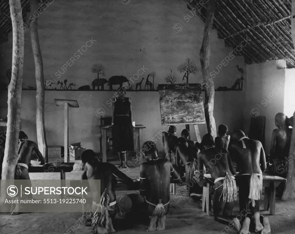The Anglo-Egyptian Sudan.Government-subsidized mission schools bring education to the children of the South. The teacher are nearly all Sudanese. The is a girls' school at the village of Yei. November 25, 1953. (Photo by Camera Press).