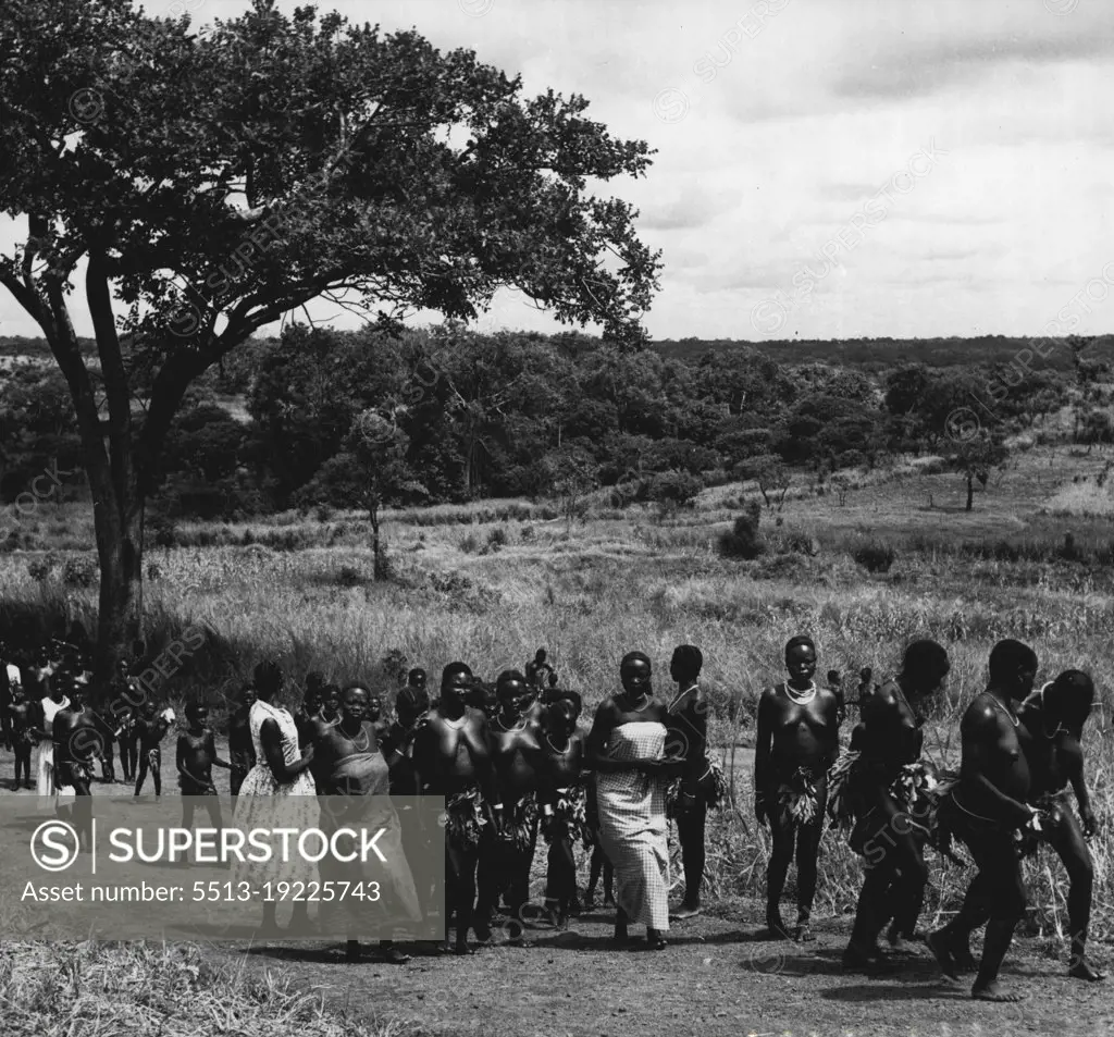 The Anglo-Egyptian Sudan.Villagers from Poni in the Yei district arriving at local Church. This is a region in Equatorial ***** church-going is immensely popular. December 2, 1953. (Photo by George Rodger, Camera Press).