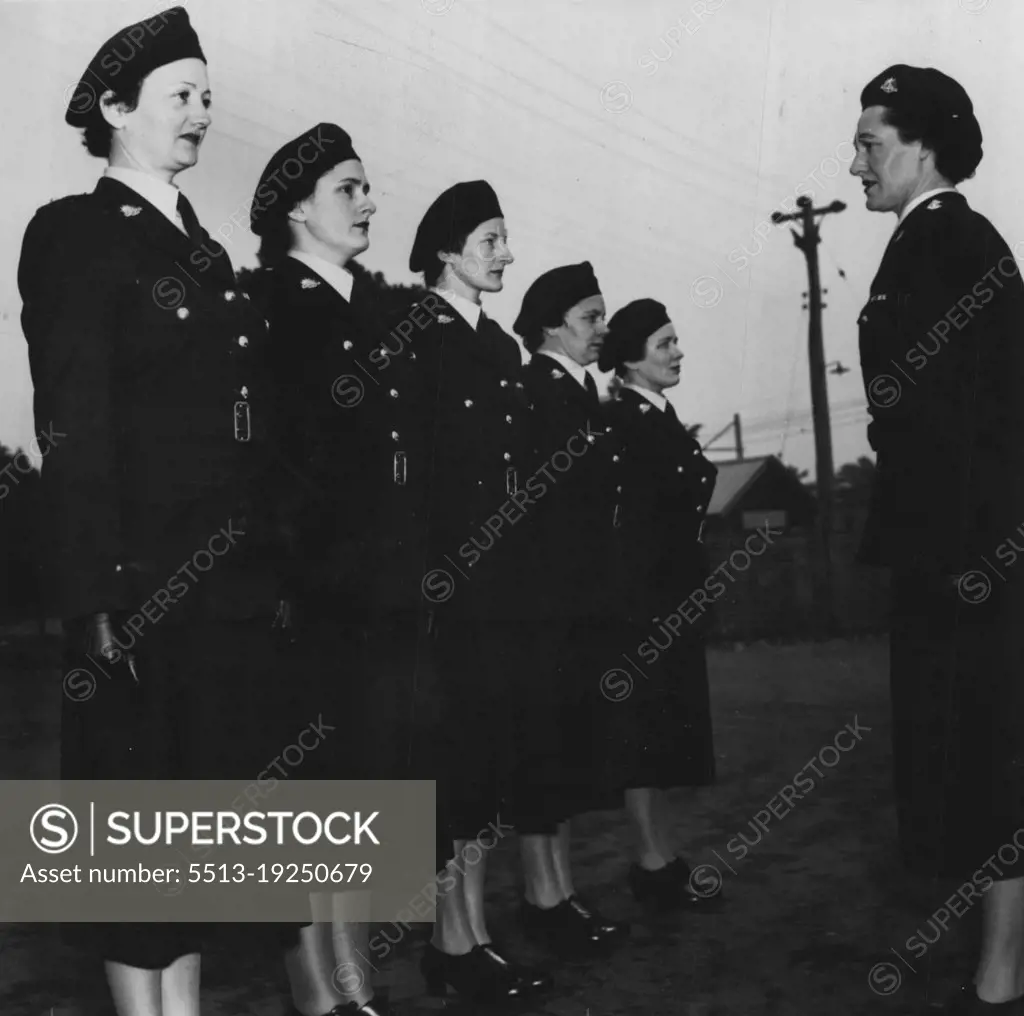 First Full-Dress -- Parade today of members of the Women's Auxiliary Army Corps in their smart new green uniforms. These girls will leave for Canberra this afternoon to take part in the Jubilee opening of *****. June 14, 1951.