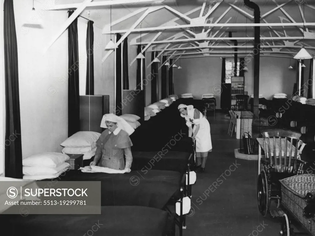 More Hut Hospitals -- A ward in one of the emergency hospital hutments near London.No provide extra accommodation in case of air raids, construction of further blocks of hospital hutments has been started.Hospital hutments so far completed provide 35,000 beds, which 16,500 are in districts around London. September 9, 1940. (Photo by London News Agency Photos Ltd.).