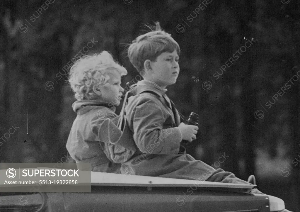 Royal Spectators At The European Horse Trials -- Two keep your spectators, perched on the roof of the Royal land rover for the best view, during the speed and Endurance That of the European Horse Trials at Windsor are 4-years-old Princess Anne and her "big" brother Prince Charles (6), equipped with binoculars.The Royal Family have been ***** daily spectators during the four days (May 1th. to 21st) of the European Horse Trials at Windsor Great Park, in which horse seen and horsewomen of ten nations have been competing. February 28, 1955. (Photo by Fox Photos).