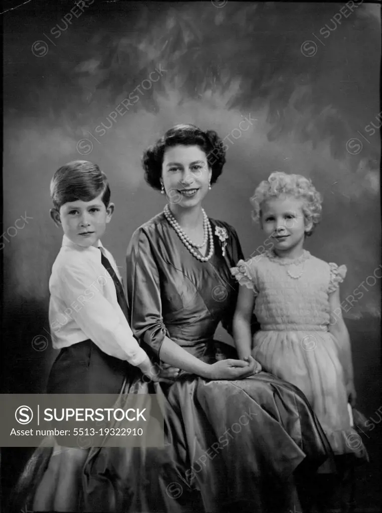 H.M. The Queen With H.R.H. Prince Charles And H.R.H. Princess Anne.A new and charming study of her majesty, with T.R.H.'s Prince Charles and Princess Anne. December 26, 1954. (Photo by Marcus Adams, The London Electrotype Agency Ltd.).