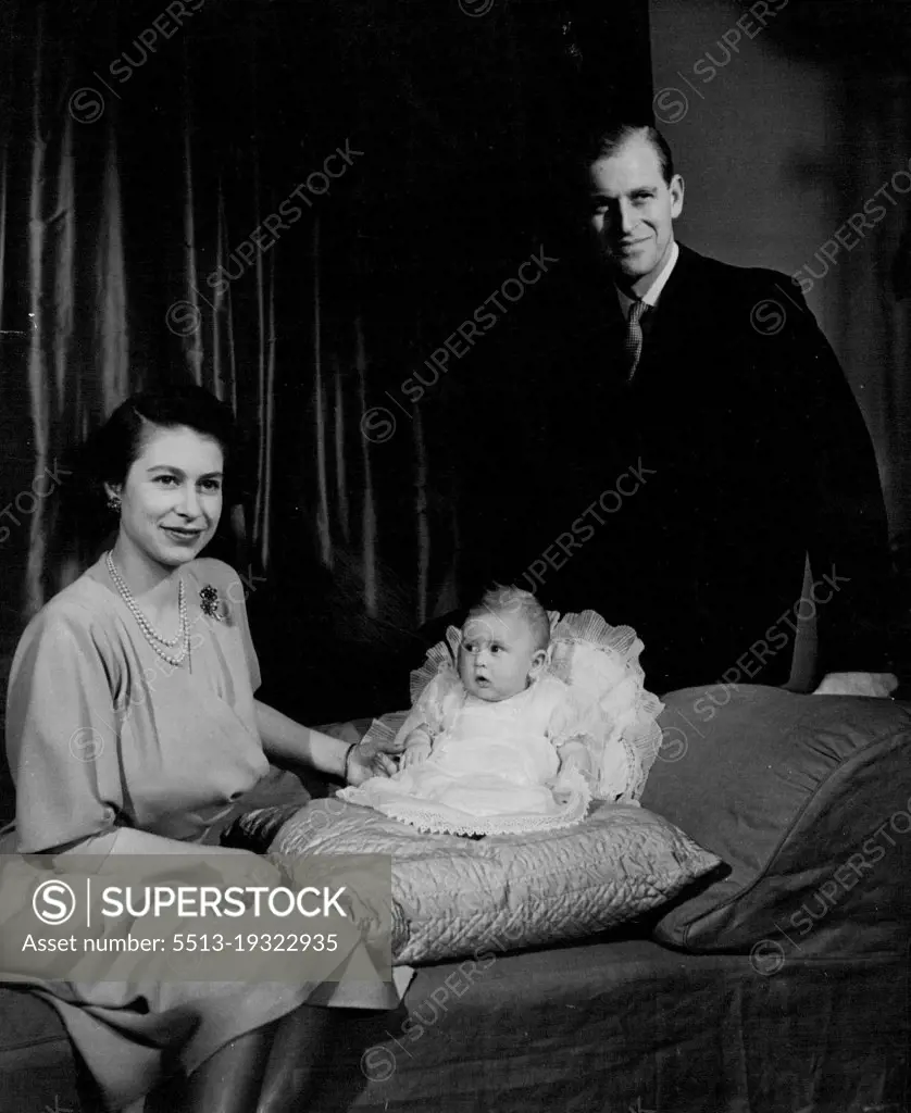 T.R.H. Princess Elizabeth And The Duke of Edinburgh With Prince Charles.Taken by Royal Command, photograph shows Princess Elizabeth and the Duke of Edinburgh with Prince Charles at Buckingham Palace. This is the first picture of the family together. May 5, 1949. (Photo by Baron, Baron Photo Centre Ltd.).