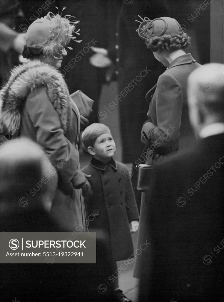 His Big Moment :Prince Charles went to London's Euston Station to meet his parents today, November 17, on their return from Canada.Here he turns his face up to chat with his mother, Princess Elizabeth, at left is the Queen, his grandmother. February 13, 1952. (Photo by Associated Press Photo).