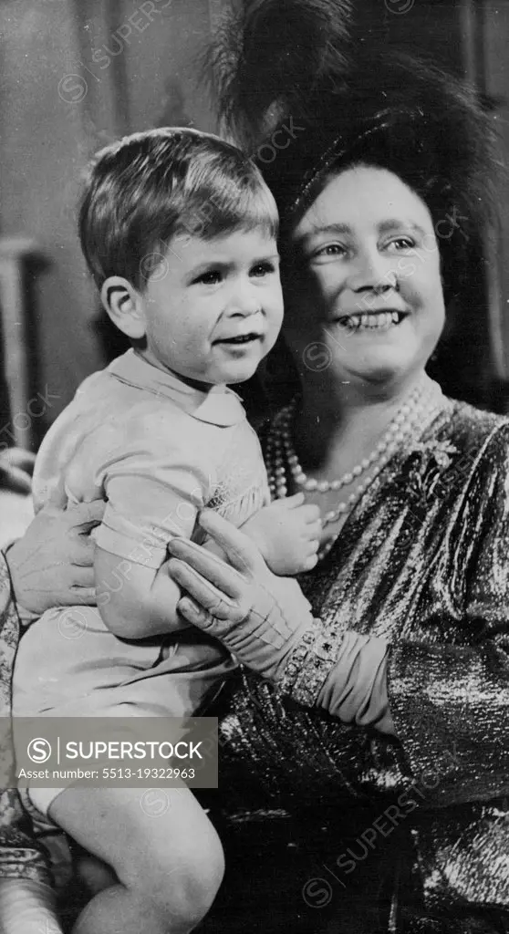 1950... The young Prince with Elizabeth now the Queen Mother. November 11, 1950. (Photo by The Associated Press Ltd.).