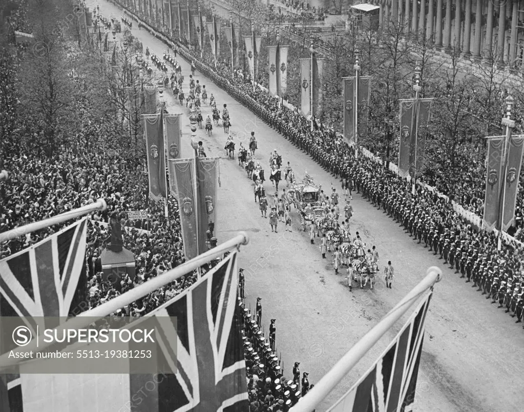 King And Queen's Coronation Drive To The Abbey -- Picture taken from Admiralty Arch showing the King and Queen driving in the State Coach down the Mall, enrouts to the Abbey. May 12, 1937. (Photo by Keystone).
