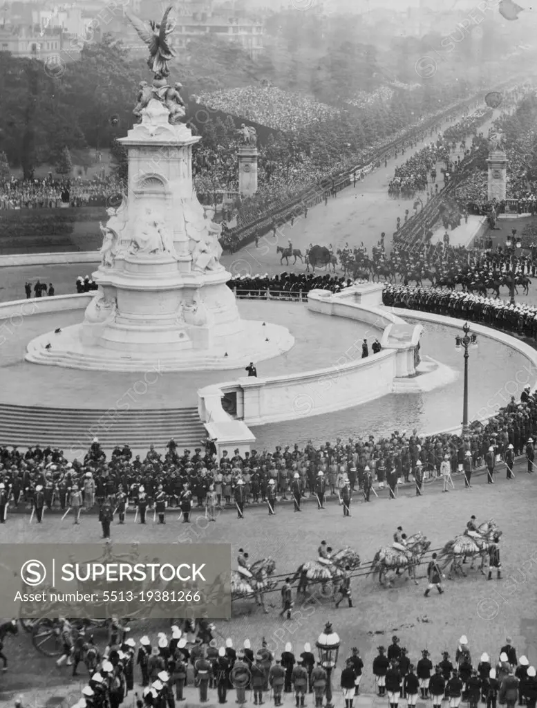 The Coronation - 1911 -- The approaching Coronation of King George VI  at Westminster on May 12th, brings back memories of the last Coronation - that of his father King George V.This interesting picture, taken from one of the windows of Buckingham Palace, shows: The Royal Coach Departing On Its Way To The Ceremony for the Coronation of King George V in 1911.The Victoria Memorial can be seen very prominently in this picture. April 26, 1937.