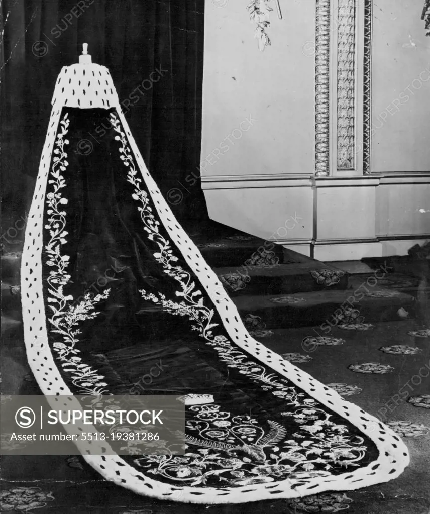 Robe Of State - The purple robe of state worn by the Queen Mother at her coronation in 1937. Elizabeth II has chosen this type of robe -- hanging from the shoulders and worn with a magnificent dress. The embroidery design will be different. December 3, 1952.