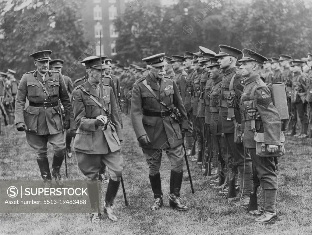 Duke Of Connaught Inspects London Irish Rifles Today -- Photo taken today Sunday, at the Duke of York's Head-quarters shows. The Duke of Connaught inspecting member of the London Irish Hifles. The Regt. leaves today for Ireland to enjoy their annul training. This is the first time a Territorial unit has left England for their annual training. July 19, 1931. (Photo by Photopress).
