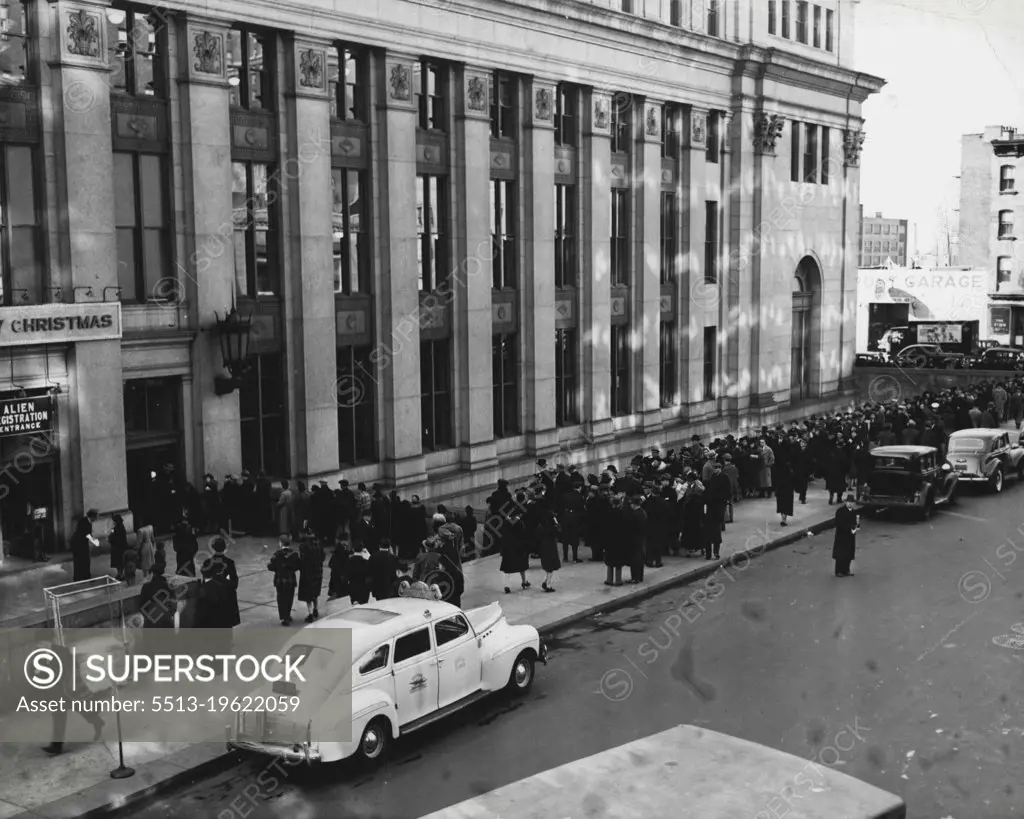 New York Aliens Rush To Register -- Aliens lined up outside the New York City General post office Monday, to beat the deadline for Alien registration, which ends Thursday, Dec. 26. December 23, 1940. (Photo by ACME).