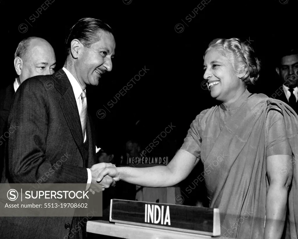 Opening Of The  Eighth Session of The U.N. General Assembly - Ambassador Nasrollah Entezam, of Iran, shaking hands with Mrs. Vijaya Lakshmi Pandit, of India, this afternoon, before the opening of the eighth session of the U.N. General Assembly. Later on, the Assembly elected Mrs. Pandit as its President.Mr. Entezam was President of the Assembly's fifth session. September 15, 1953. (Photo by Paul Popper Ltd.).