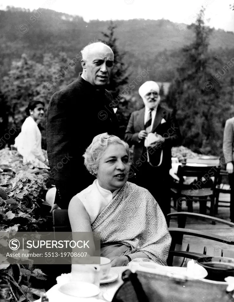 Jawarlal Nehru and His Sister Mrs. R.S. Pandit.The Indian Prime Minister is seen with his sister, who is Indian High Commissioner in London. The photograph was taken in Austria where Mr.Nehru held a conference on India's foreign policy which was attended by his Ambassador to Europe. July 27, 1955. (Photo by Camera Press).