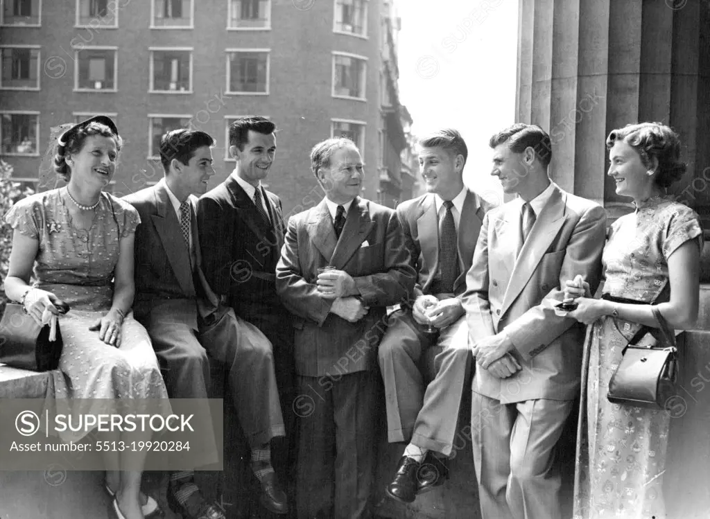 Balcony Scene - Mrs. Harry Hopman (wife of the team captain): Ken Rosewall: Mervyn Rose: Sir Thomas White: Lewis Hoad: Frank Sedgman: Beryl Penrose. In the Heatwave - London's eighty-old temperature sends members of the Australian tennis team (now successfully competing at Wimbledon) on to the balcony of Australia House, Strand, during a reception given by Australian High Commissioner Sir Thomas White to-day (Tuesday). July 01, 1952. (Photo by Reuter Photo).
