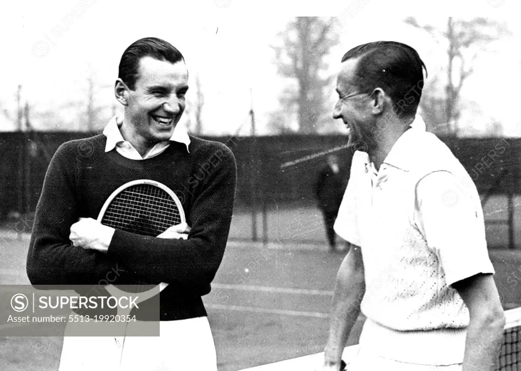 F.J. Perry Playing Tennis AgainFred Perry (left) in happy mood with G.P. Hughs, his fellow Davis Cup player, with whom he had a knock-up at Wimbledon, London, to-day.F.J. Perry, Wimbledon lawn tennis champion, returned to practice this week. Except for one match in Australia this is his first tennis since September. Never before has he had so long a rest from the game. February 24, 1936. (Photo by Topical Press).